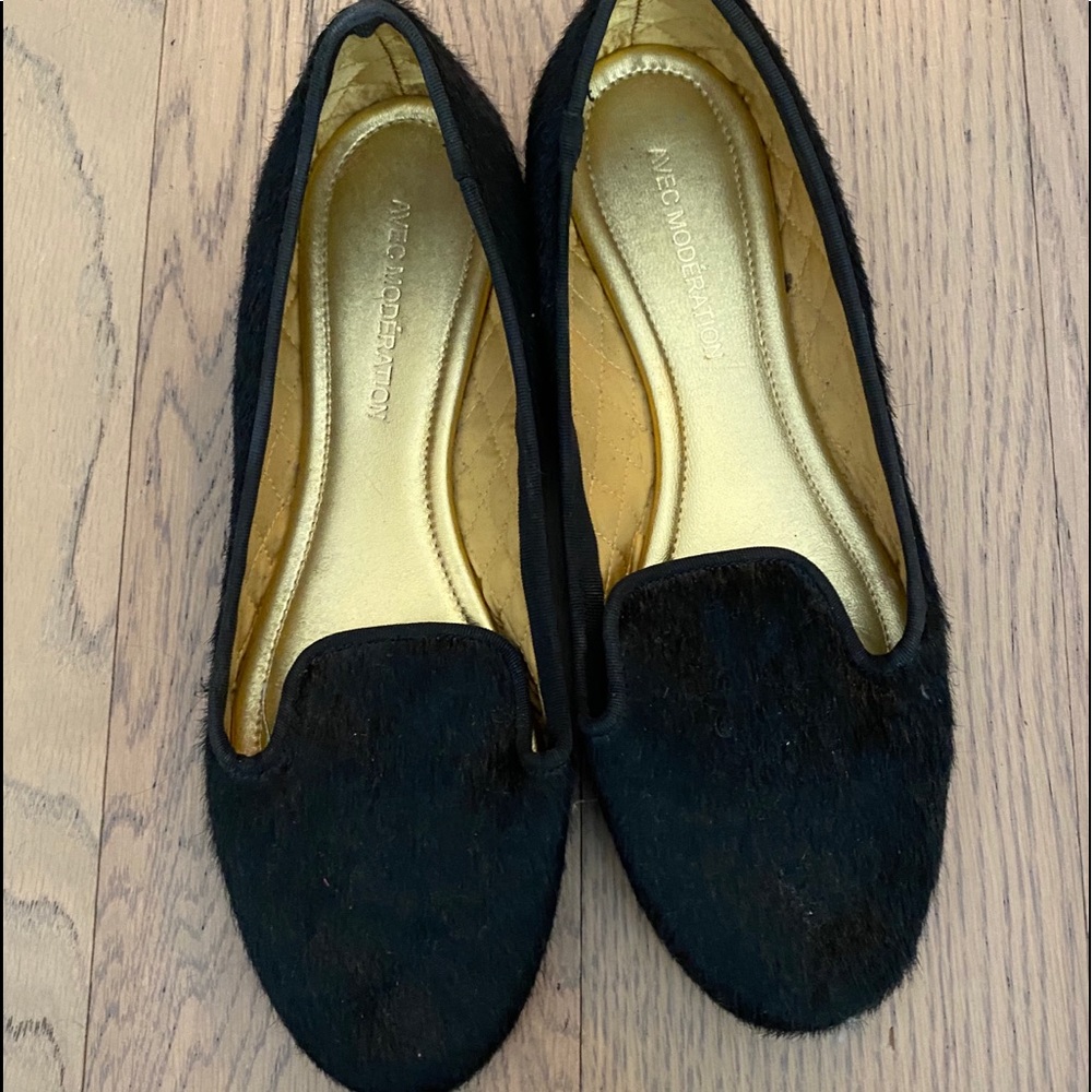 Black animal haired flat shoes